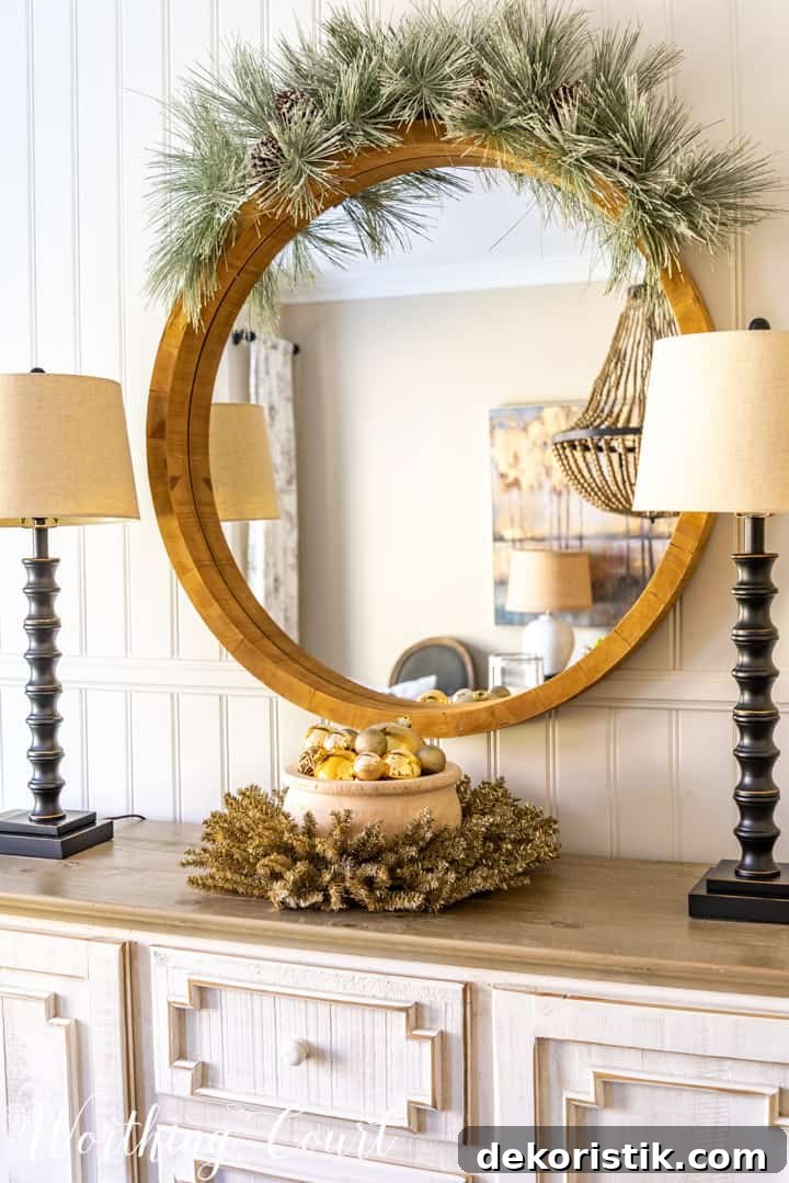 Rustic Christmas Dining Room Decor Ideas for Elegant Tables 16 round mirror above sideboard with Christmas decorations