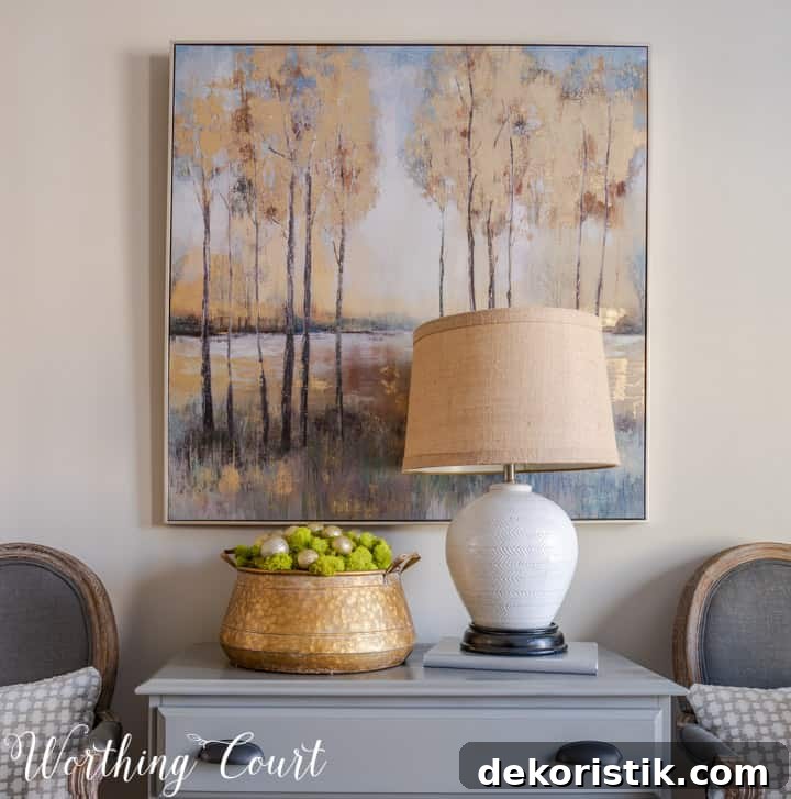 Rustic Christmas Dining Room Decor Ideas for Elegant Tables 19 gray chest flanked by dining room chairs with artwork above