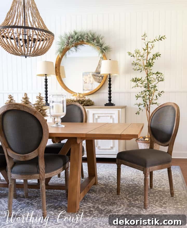 Rustic Christmas Dining Room Decor Ideas for Elegant Tables 6 dining room table, chairs and sideboard decorated with neutral colors for Christmas