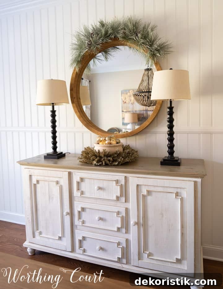 Rustic Christmas Dining Room Decor Ideas for Elegant Tables 7 sideboard and round mirror decorated for Christmas