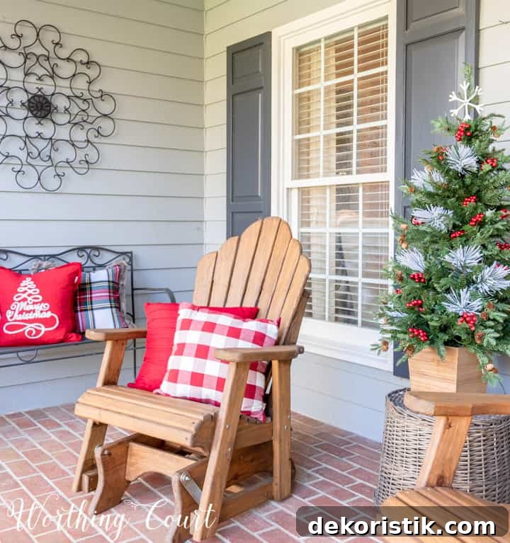 wooden Adirondack glider on porch