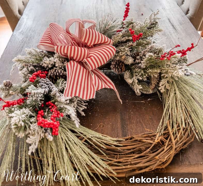 partially assembled Christmas wreath lying on a table