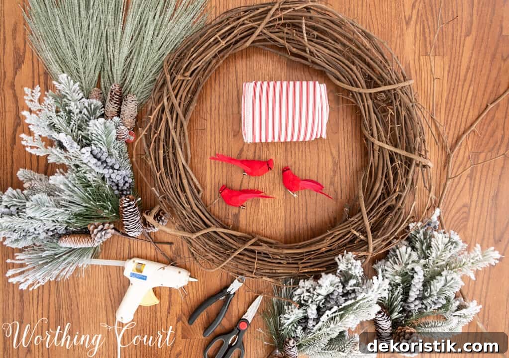 partially assembled Christmas wreath lying on a table