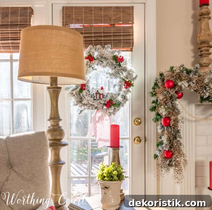 French door with flocked wreath hanging on it