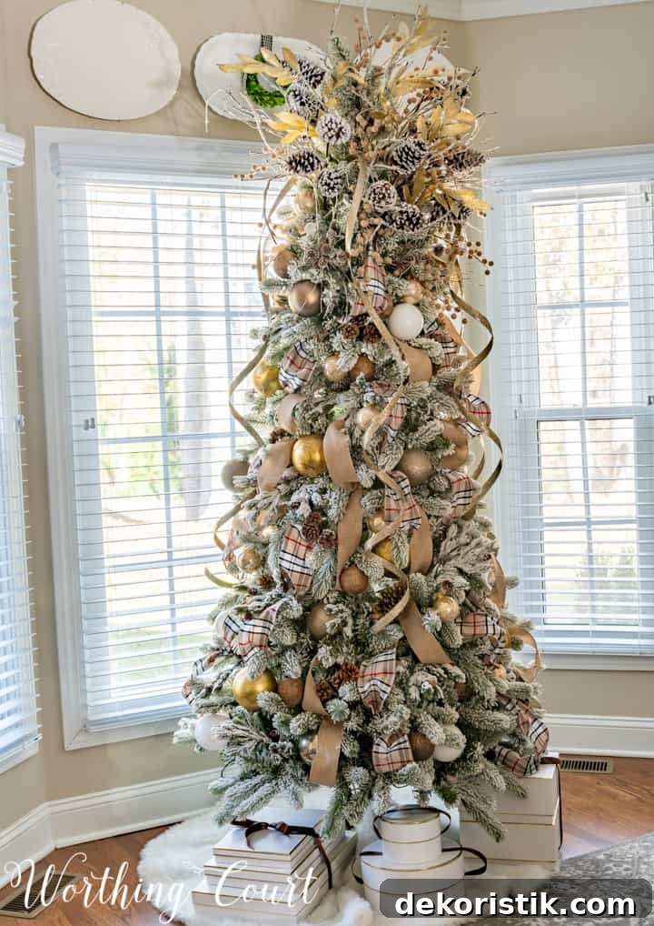 Woodsy mixed with glam ornaments on a flocked tree