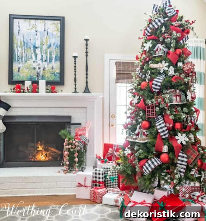 Christmas tree decorated with small cardboard houses