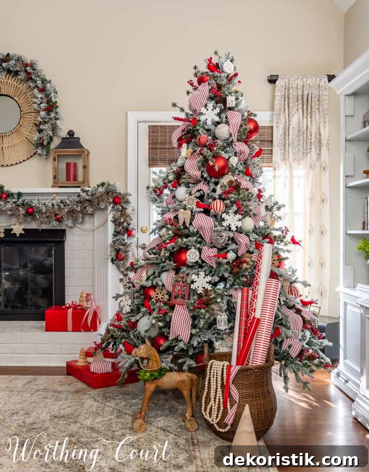 flocked Christmas tree with red and white decorations