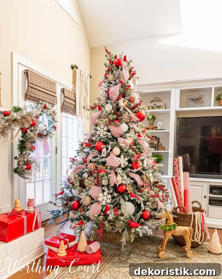 flocked Christmas tree with red and white decorations