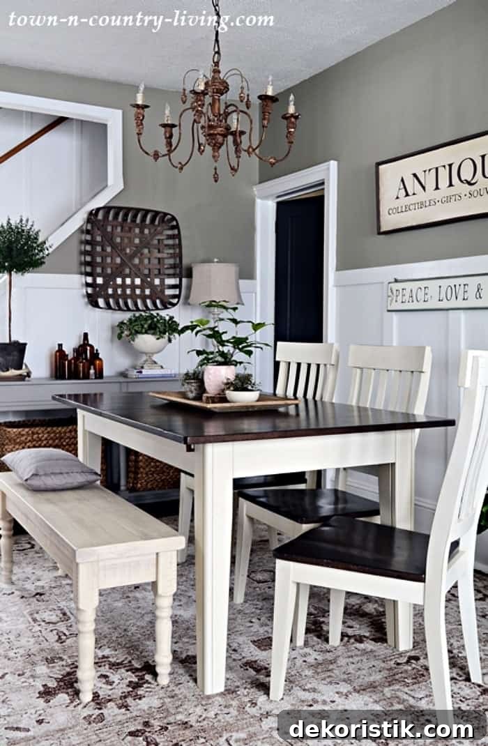 dining room table with wood top, white legs with white chairs and bench