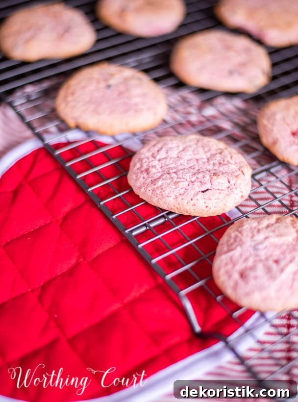 strawberry cookies on a cooling rack