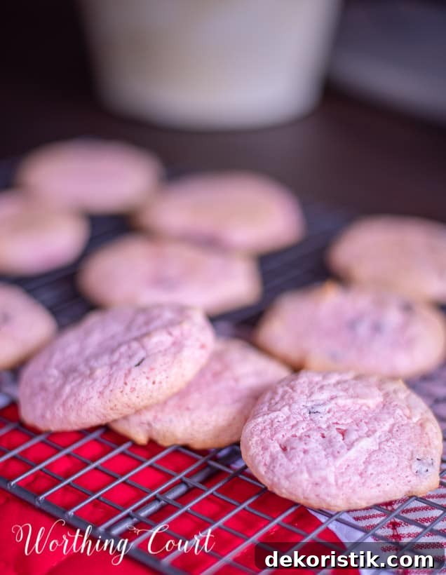 strawberry cookies on a cooling rack