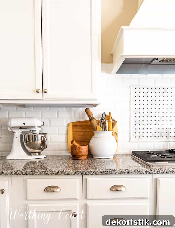 kitchen counter decorations against a white subway tile backsplash