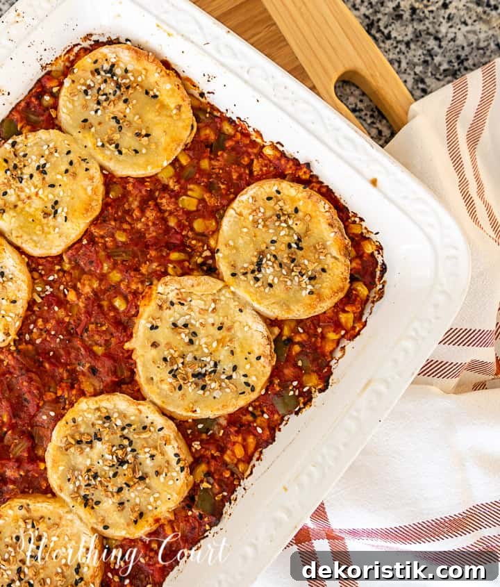 image of sloppy joe casserole topped with biscuits