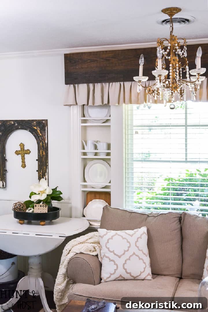 DIY Window Decor Ideas: Step-by-Step Tutorials 15 wood cornice with fabric valance above sofa
