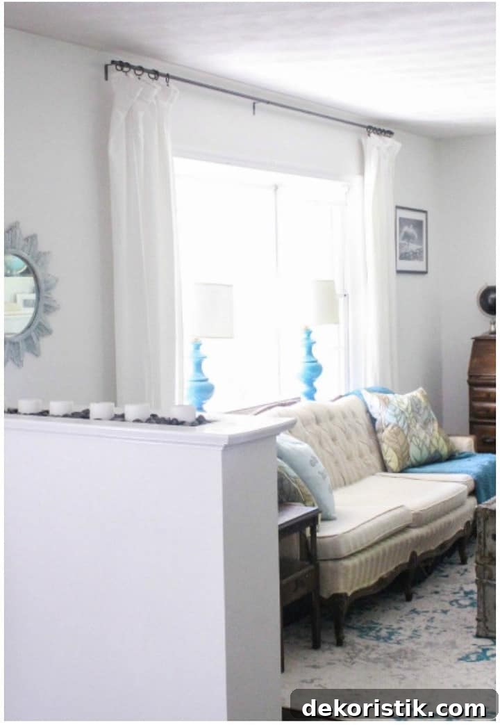 DIY Window Decor Ideas: Step-by-Step Tutorials 24 white curtains on window behind sofa
