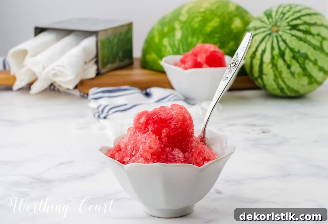 2 small white bowls filled with watermelon sorbet