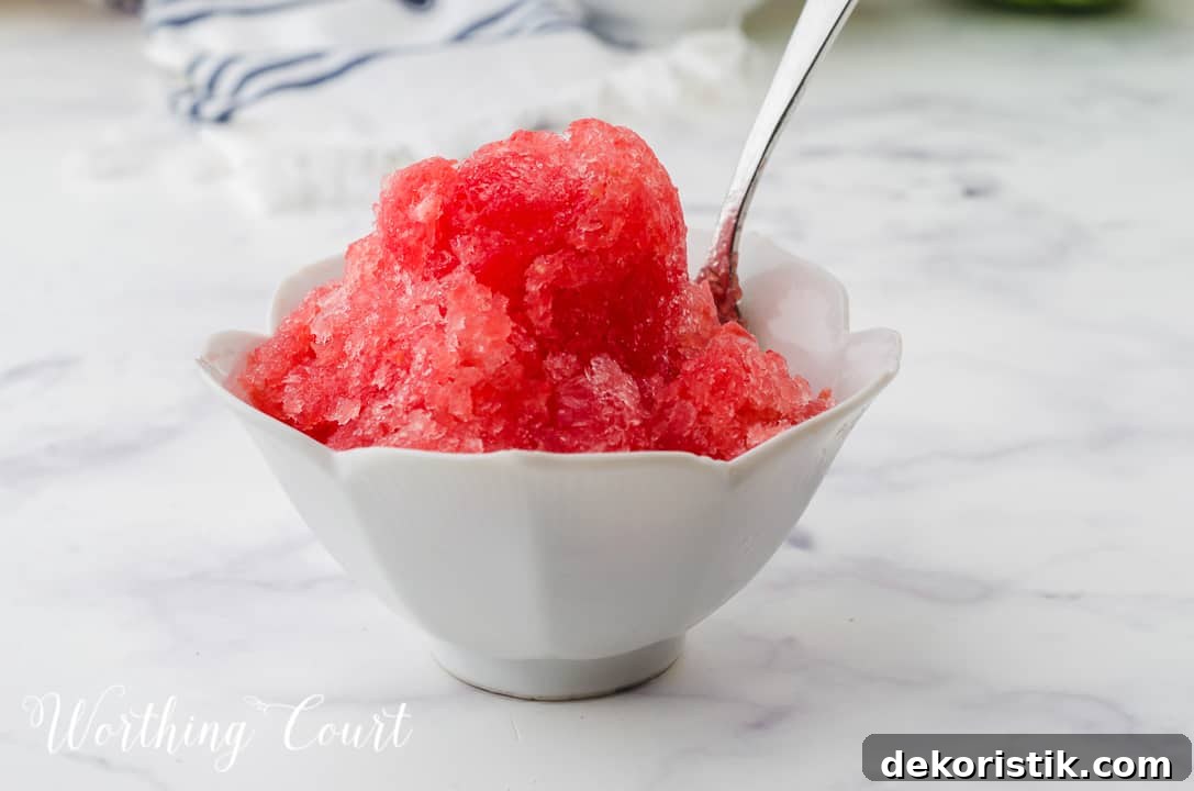 small white bowl filled with watermelon sorbet