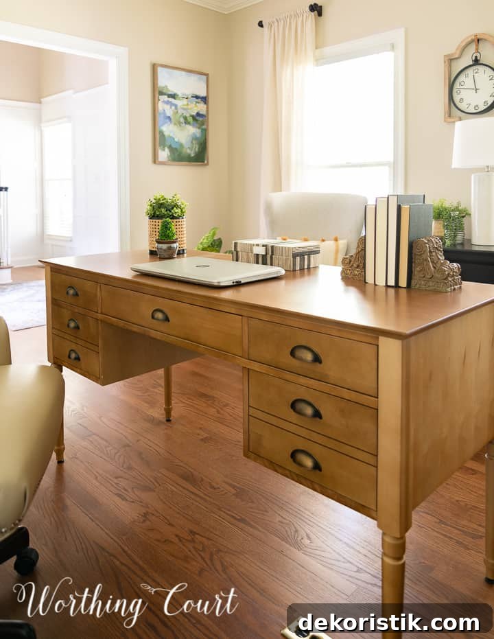 front of a natural wood toned desk