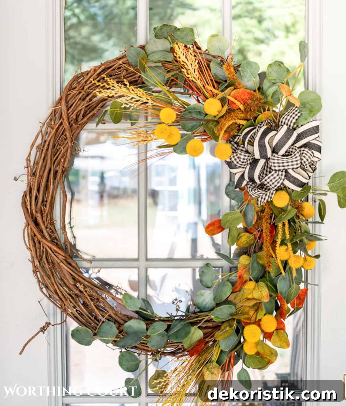 diy fall grapevine wreath with traditional fall colored picks