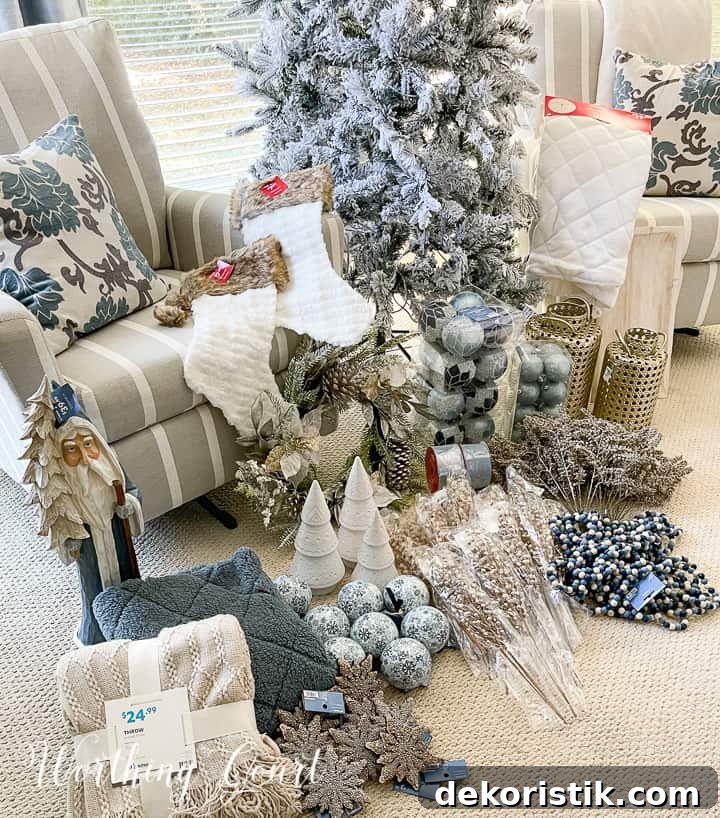 Blue and gold Christmas tree decorations laid out at foot of tree