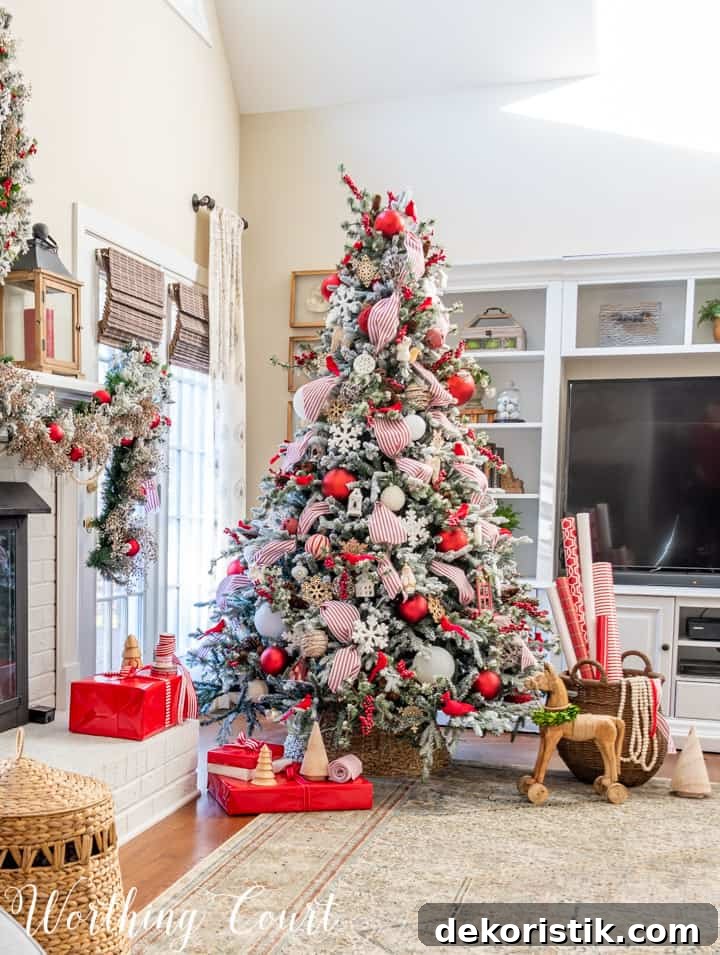 flocked Christmas tree with red and white decorations