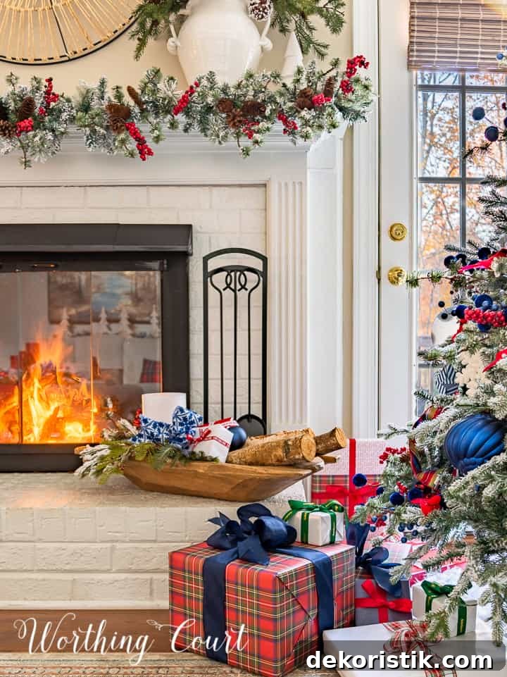blue and red plaid wrapped Christmas gift beside tree and fireplace