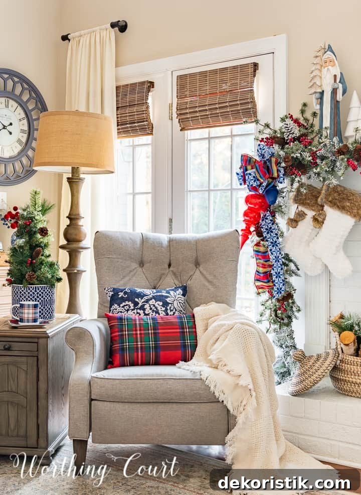 neutral colored recliner in front on windows surrounded with blue and red Christmas decor