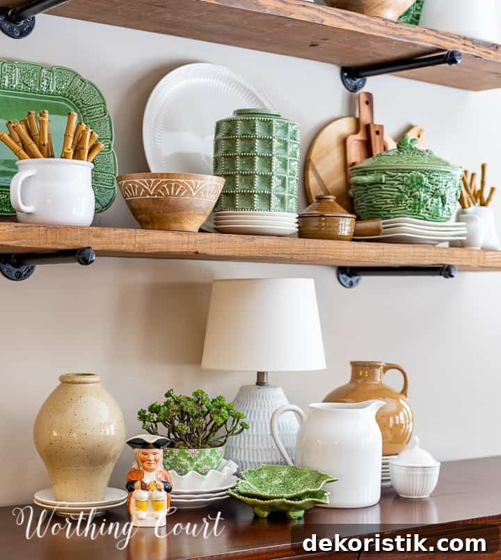 open wood shelves decorated with green, white and natural wood accessories