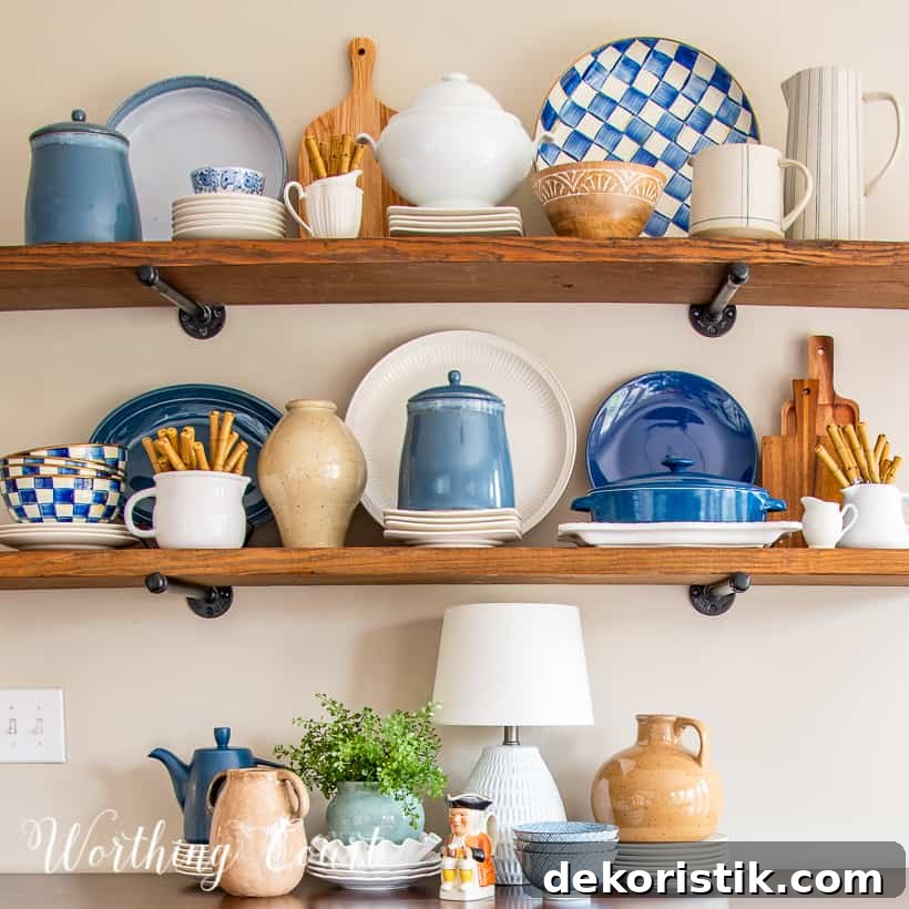 open wood shelves decorated with blue and white accessories