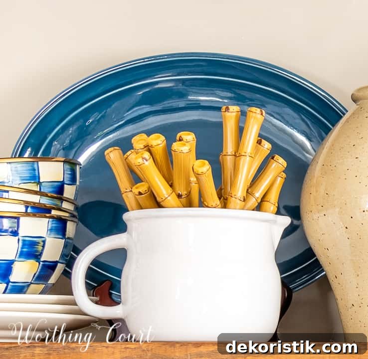 blue and white accessories on open wood shelf
