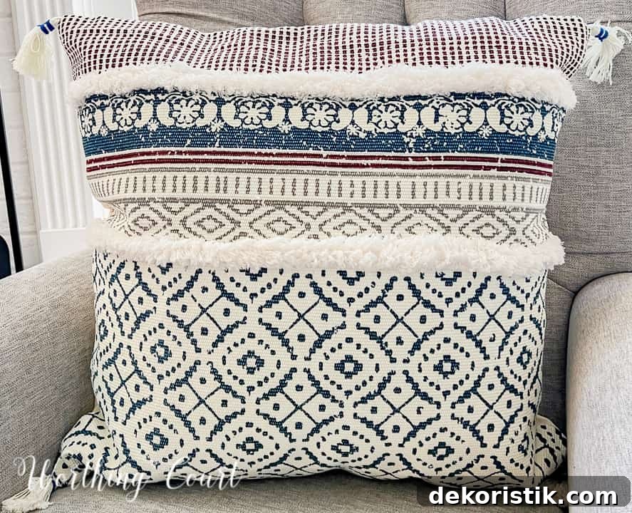 pillows on a bed styled with linens