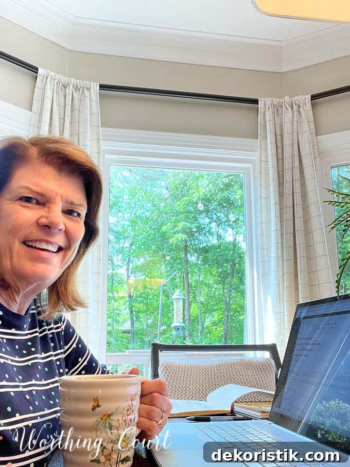 woman sitting at table with laptop