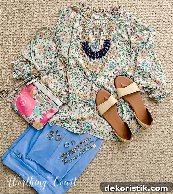 outfit with floral blouse and blue pants