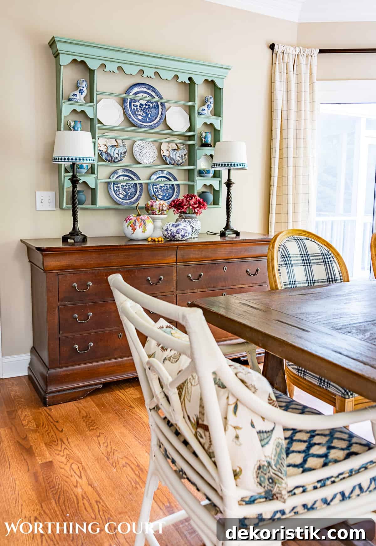 dining room sideboard with plate rack hanging above