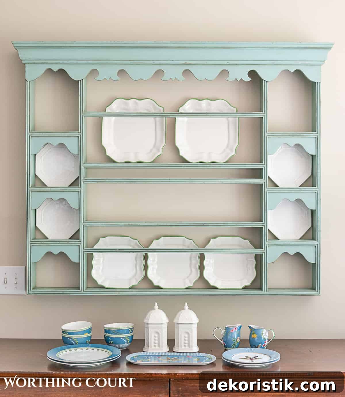 blue plate rack with blue and white dishes and tips for how to decorate a plate display rack with your favorite items
