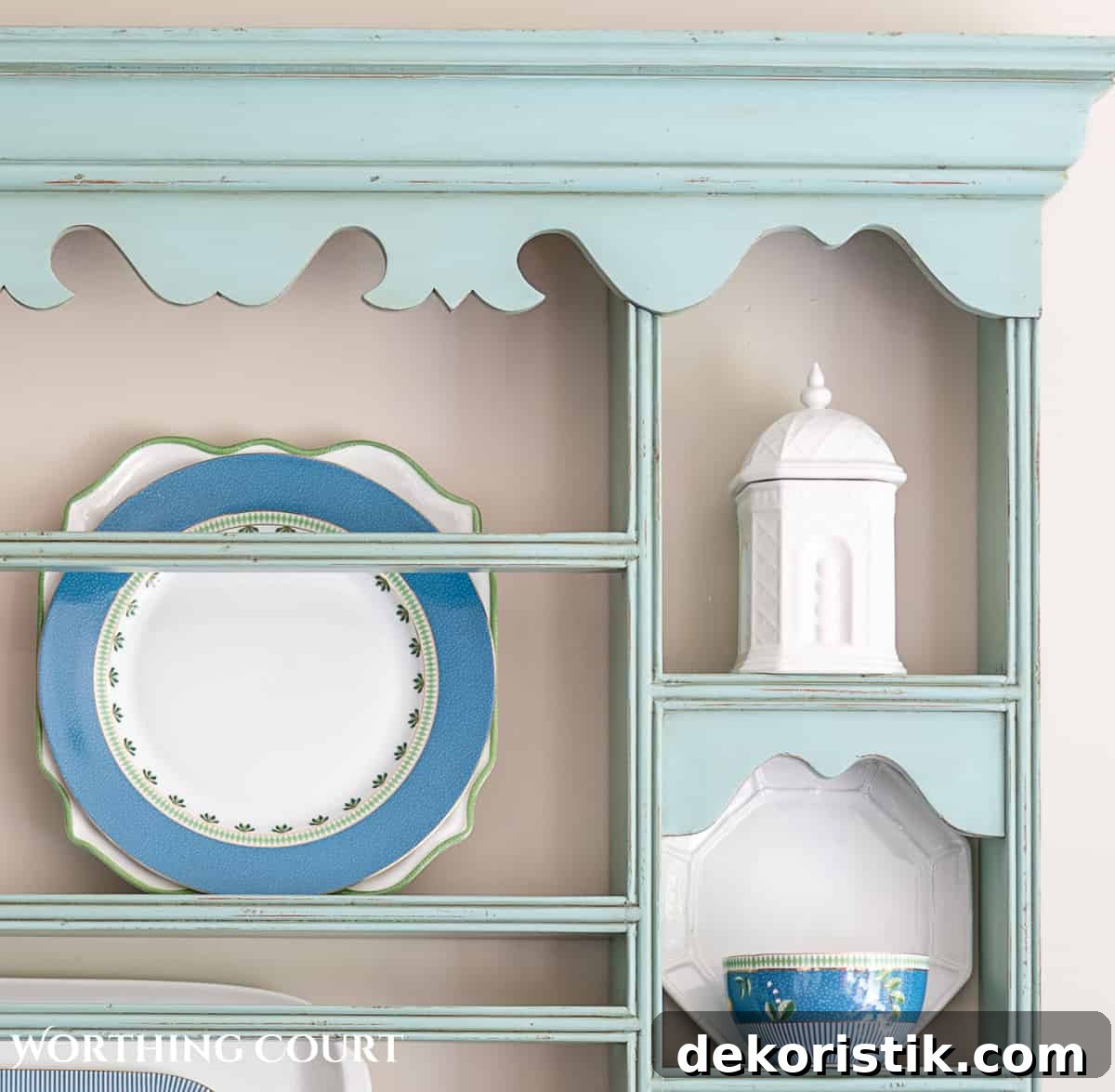 blue plate rack with blue and white dishes and tips for how to decorate a plate display rack with your favorite items