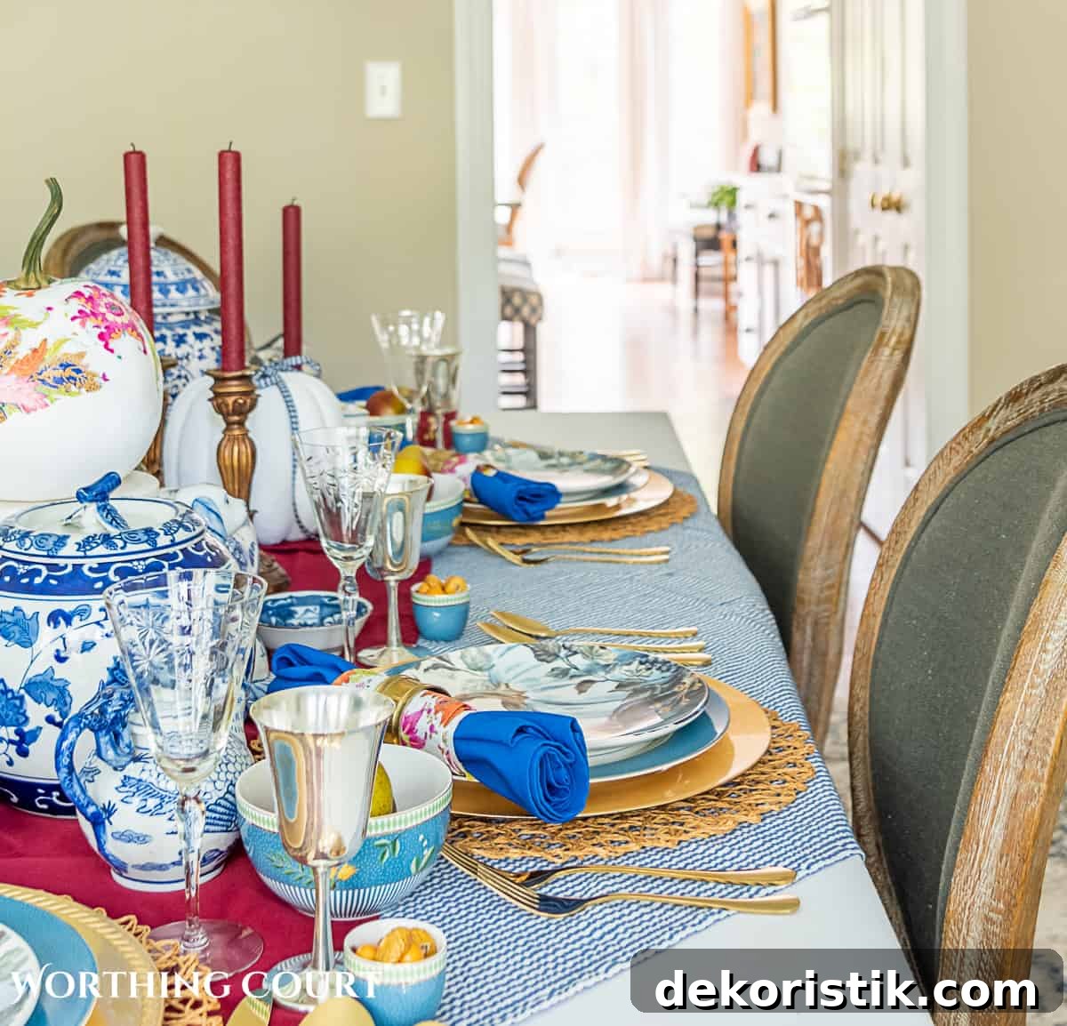 blue and white thanksgiving table setting with touches of burgundy