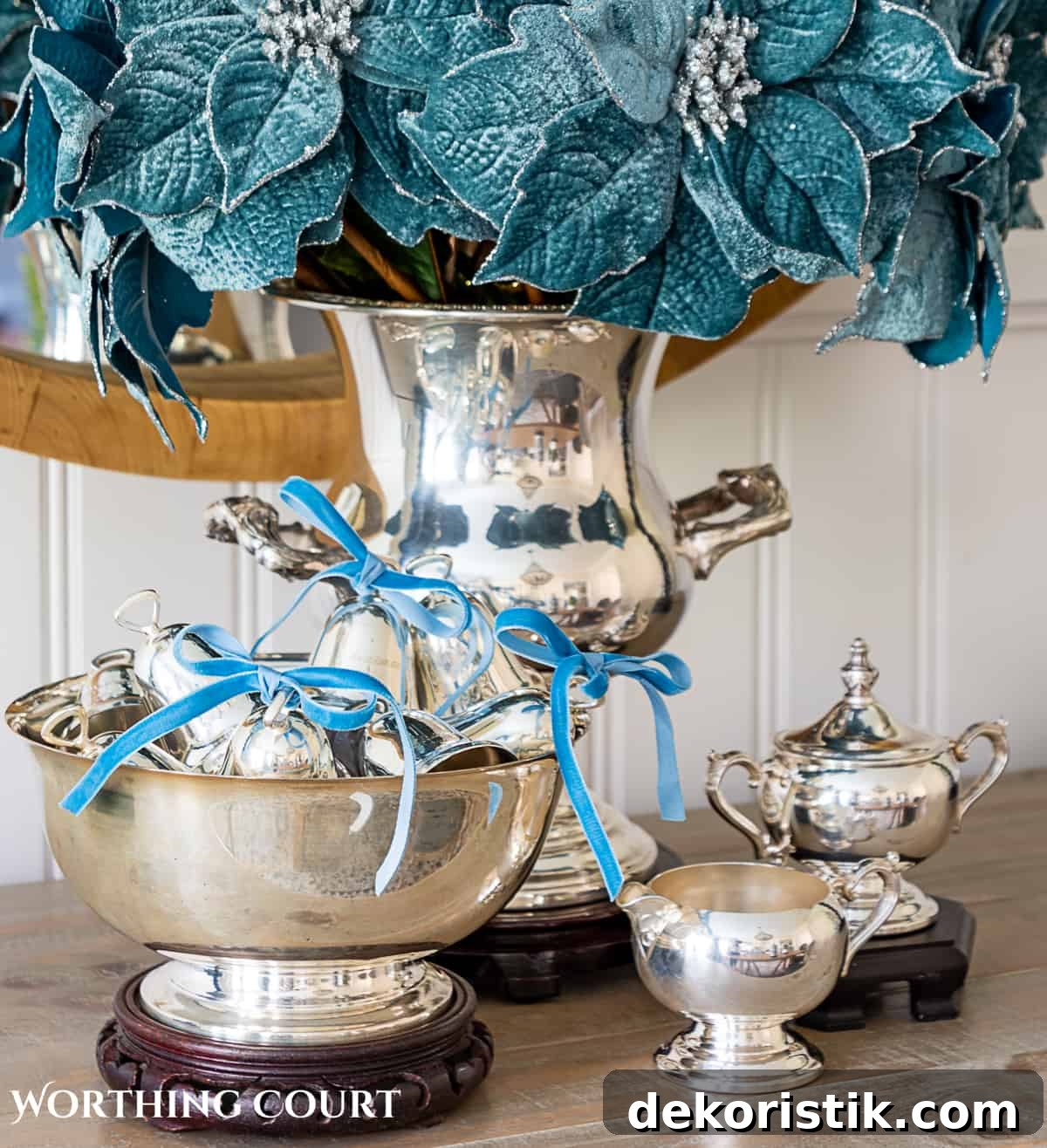 Sterling silver champagne bucket and Paul Revere bowl with French blue Christmas decorations
