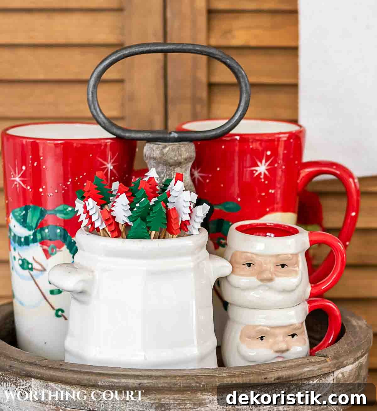 mugs and stir sticks on a Christmas hot chocolate stand