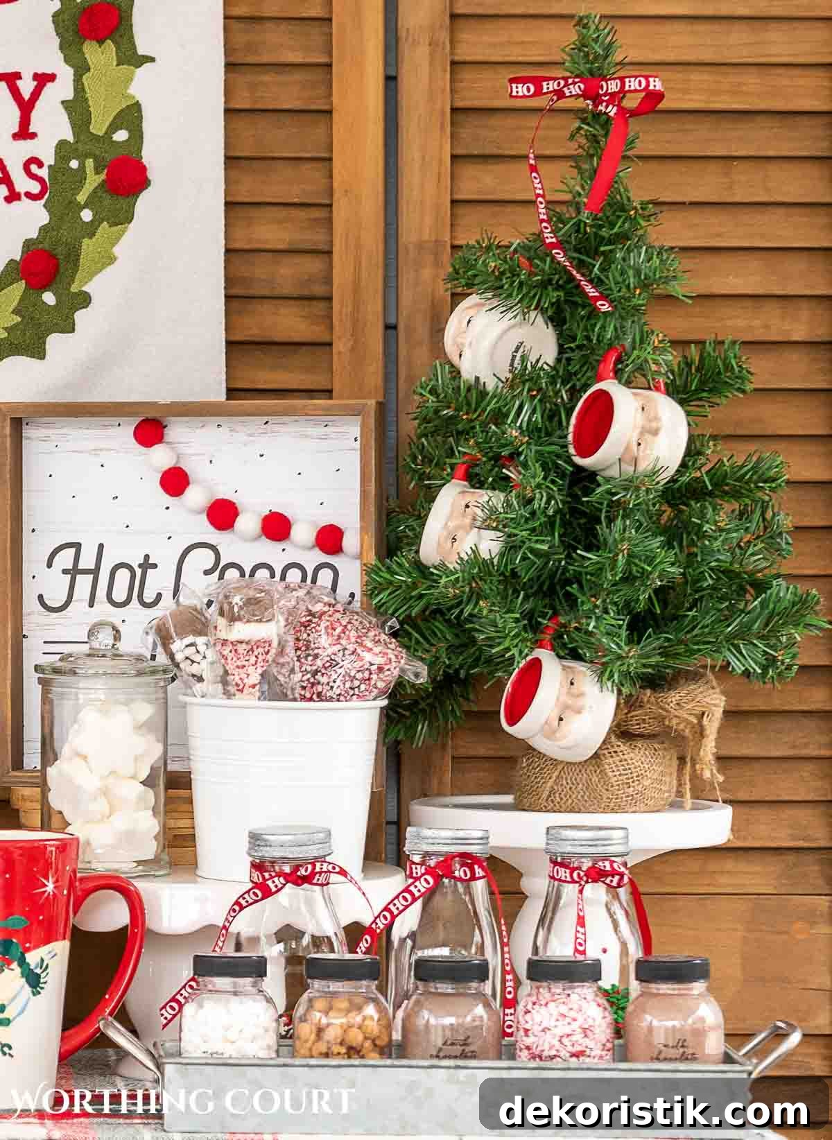 mini Christmas tree and Santa mugs on a hot chocolate bar