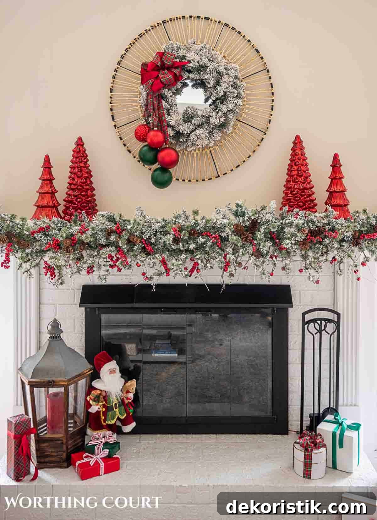 Christmas tree, fireplace and living room decorated for Christmas with red green and gold decorations