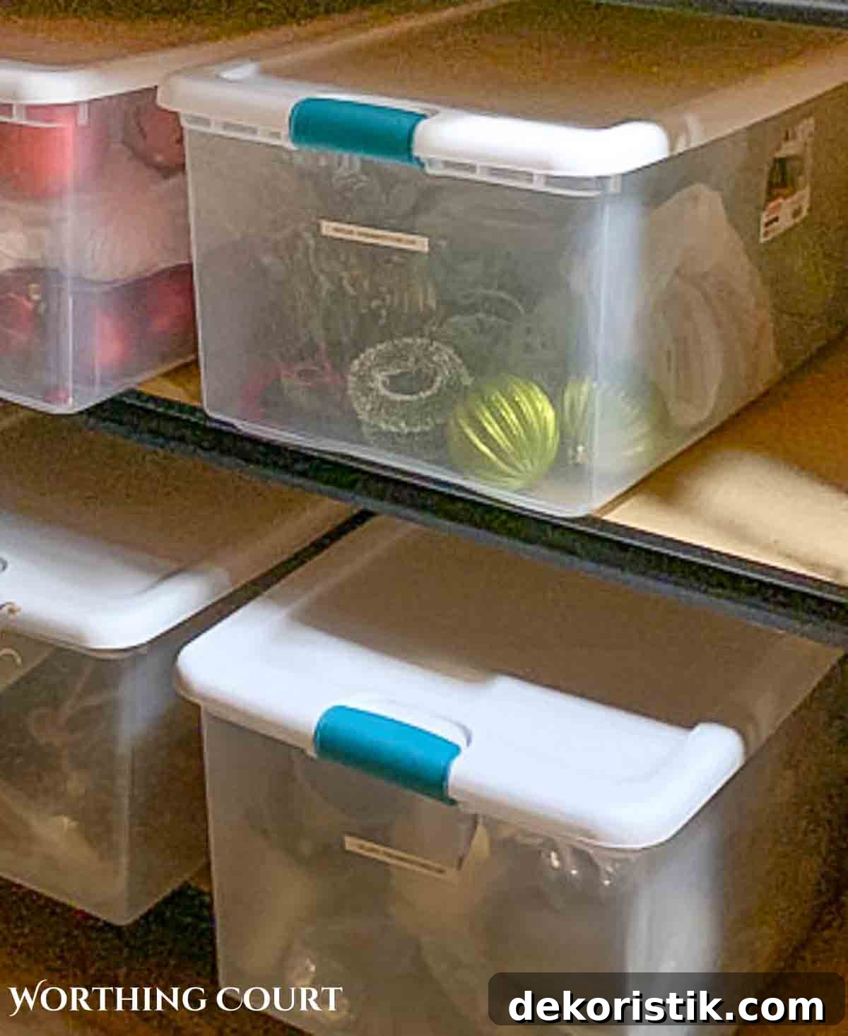 Christmas ornaments stored in a clear box with lid