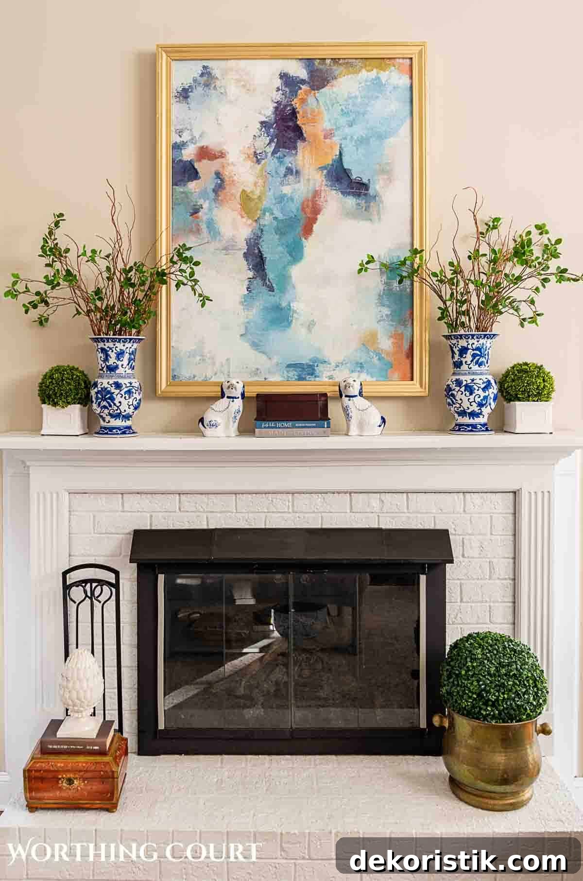 white brick fireplace and abstract art