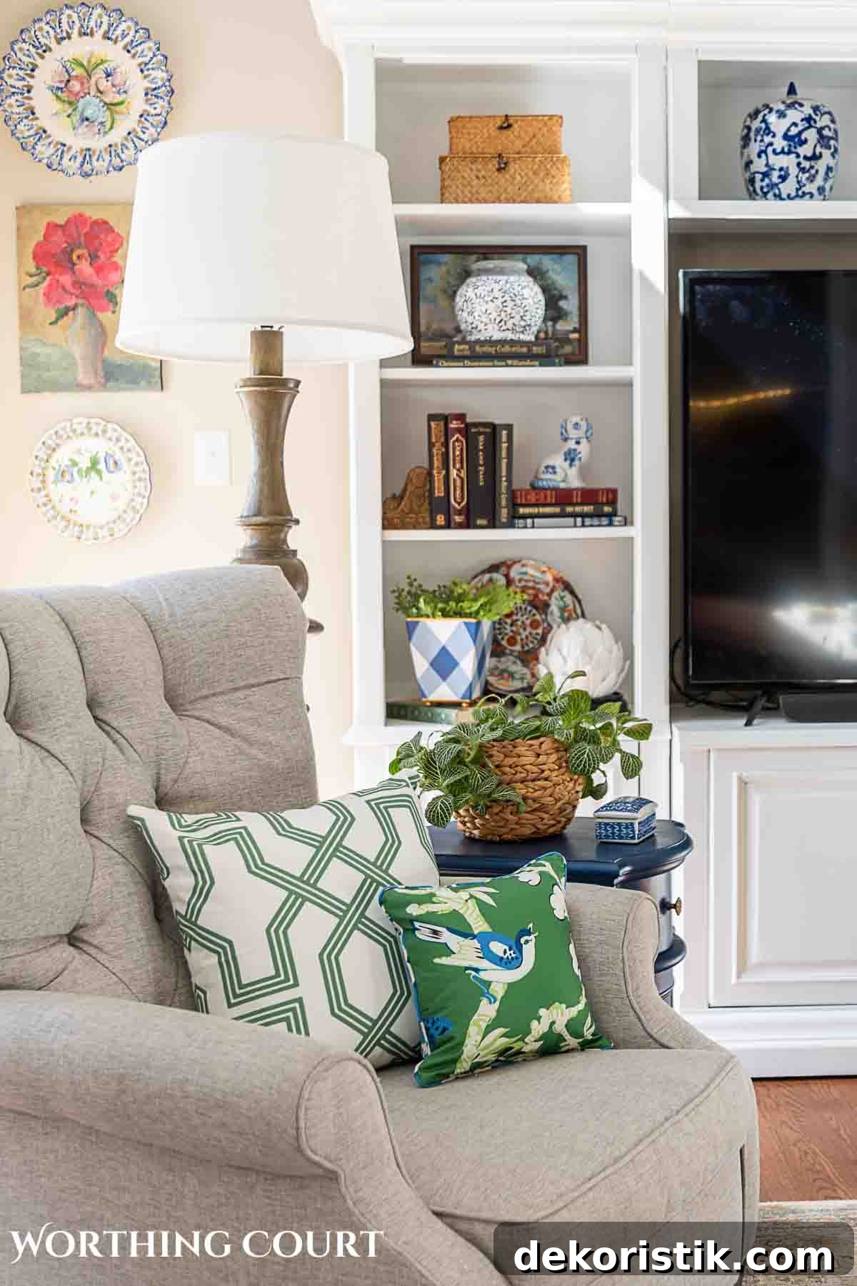 greenery and spring decorations on an end table and on shelves