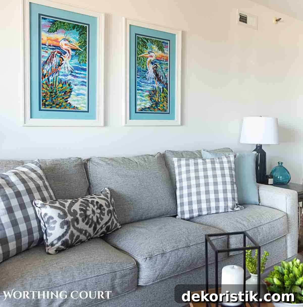 Coastal Home Decor Ideas to Transform Any Room 11 colorful coastal artwork above a gray couch