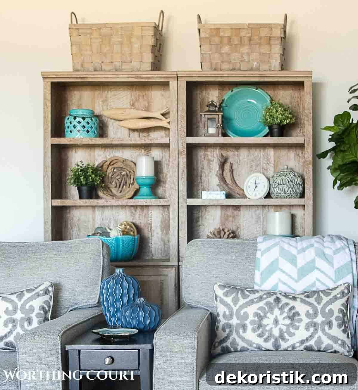 Coastal Home Decor Ideas to Transform Any Room 12 driftwood finish bookcase filled with beach inspired accessories behind two gray arm chairs