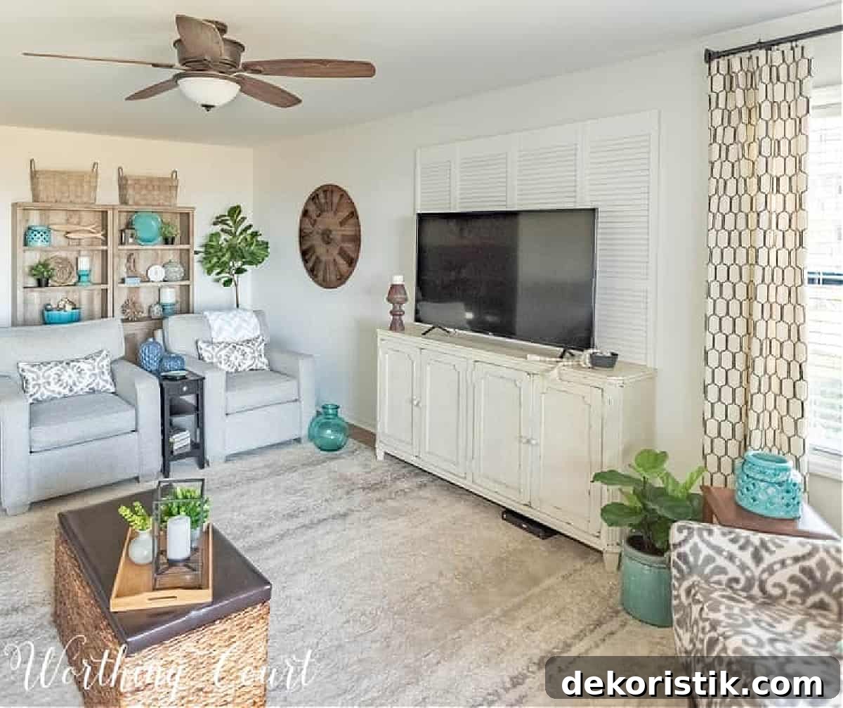 Coastal Home Decor Ideas to Transform Any Room 6 coastal style living room with gray chairs, white tv console and beachy accessories