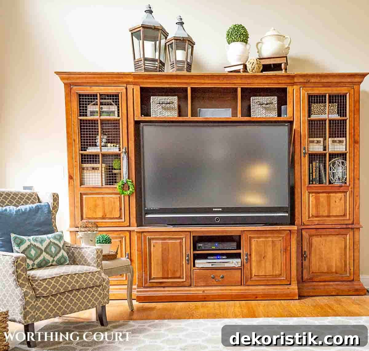 wood entertainment center with decorations