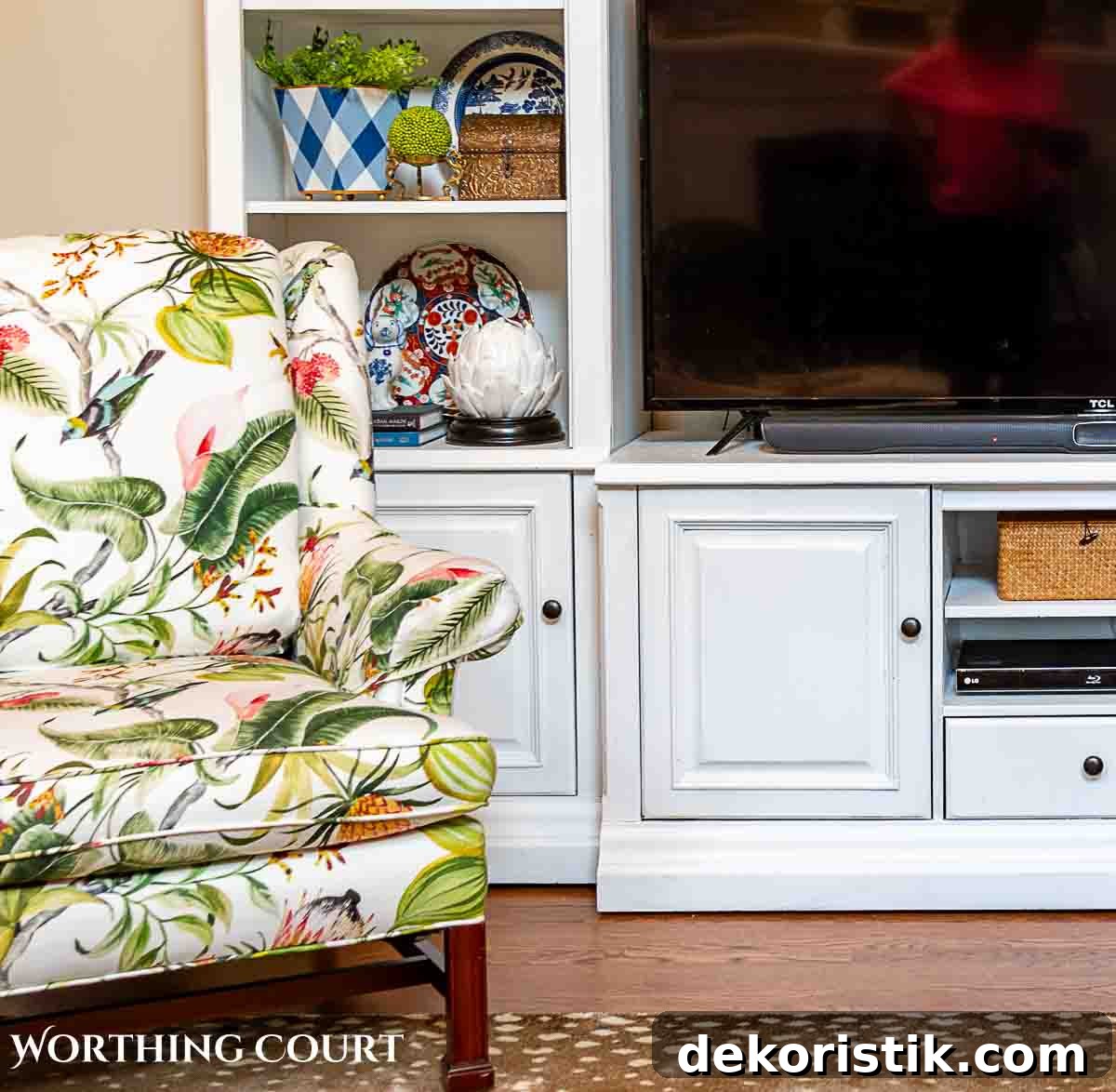 bottom portion of a white media center with accessories