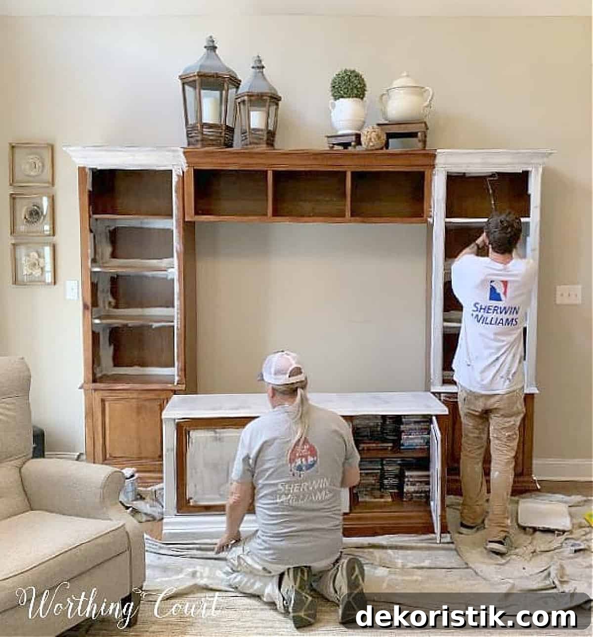 wood entertainment center in the process of being painted white